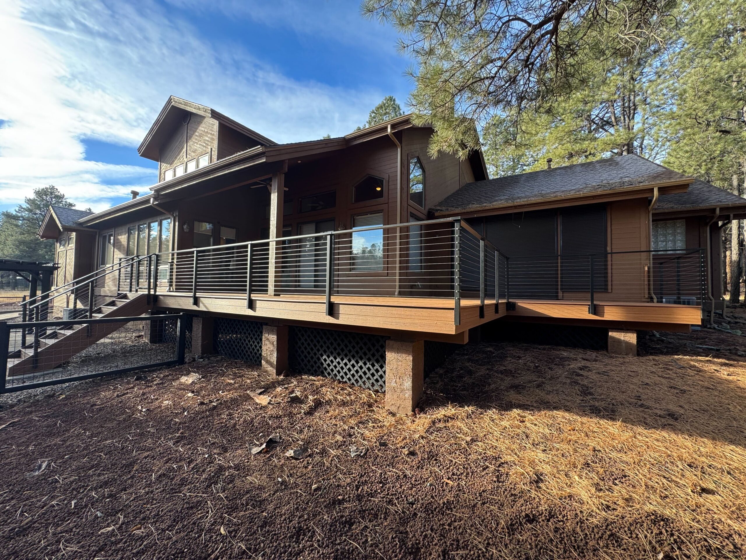 Custom elevated deck with cable railing by M3 Scape Creations — trusted Custom Deck Builder Flagstaff AZ.